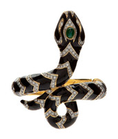 Браслет в форме змеи из золота с драгоценными камнями